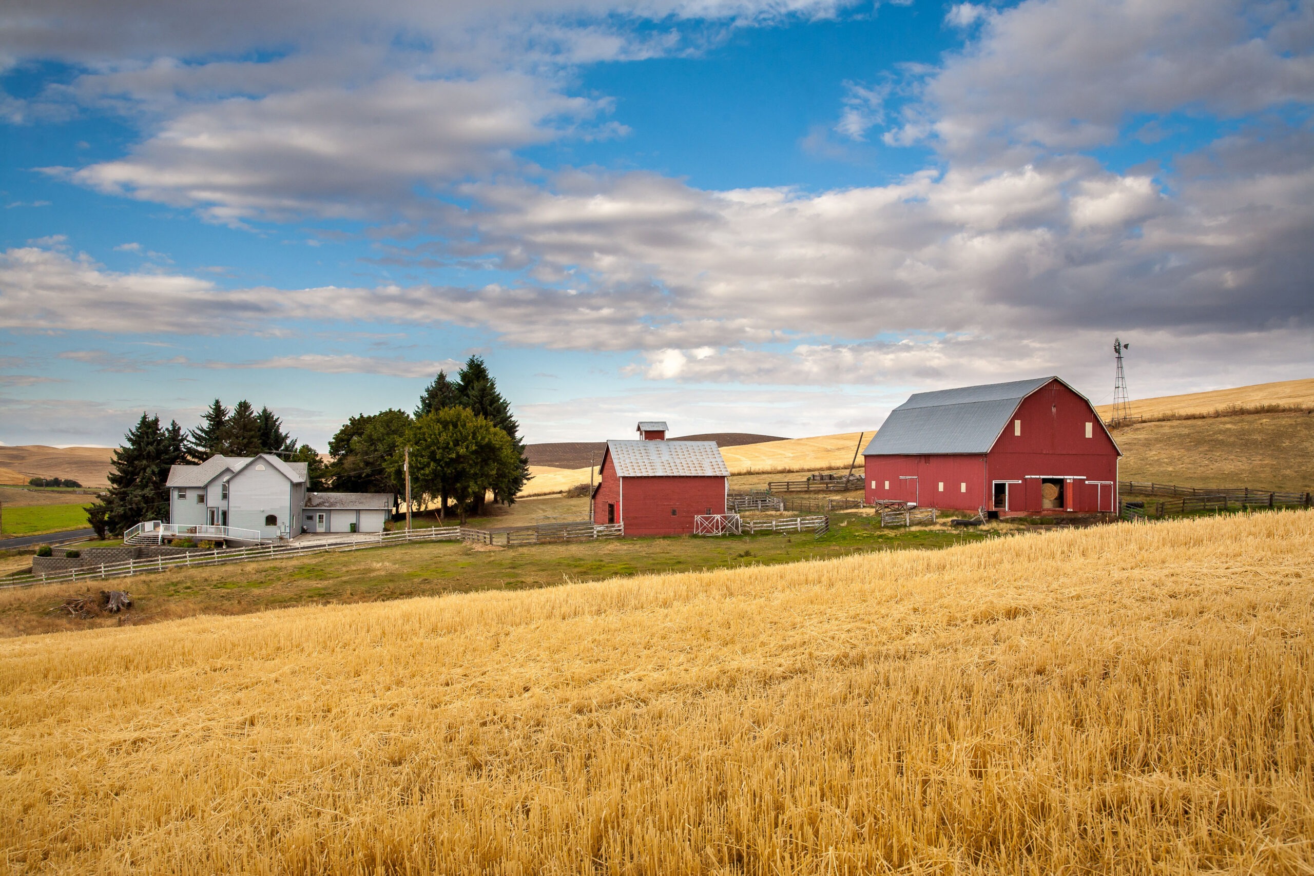 Palouse, Washington - 9/10/2010: A farm with a red barn in the f